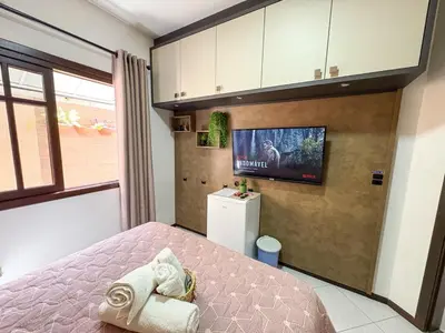 Uma cama ou camas num quarto em Quarto 2 - Hospedagem com café da manhã delicioso