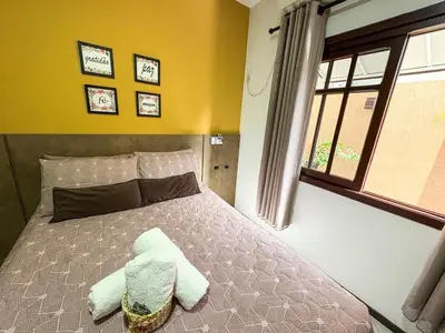 Uma cama ou camas num quarto em Quarto 2 - Hospedagem com café da manhã delicioso