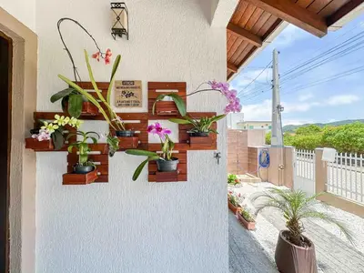 Uma varanda ou terraço em Quarto 1 - Hospedagem com café da manhã delicioso