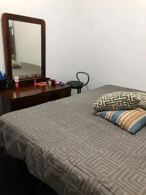 Uma cama ou camas num quarto em Casa grande a 50 metros da praia