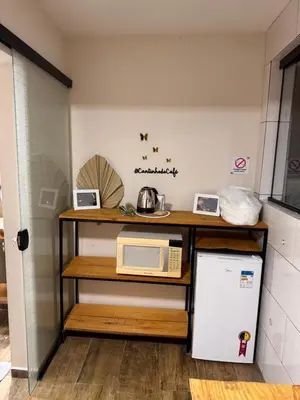A cozinha ou kitchenette de Pousada recanto do canário suite 2 Dallas