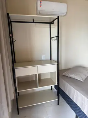 Uma cama ou camas num quarto em Residencial Lara 4