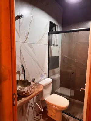 Uma casa de banho em Pousada Recanto do Canário Suite 3 Standart