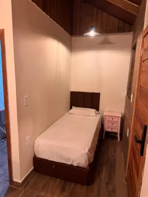 Uma cama ou camas num quarto em Pousada Recanto do Canário Suite 3 Standart