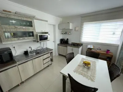 A cozinha ou kitchenette de Apartamento na praia