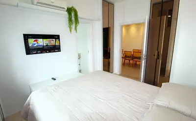 Uma televisão e/ou sistema de entretenimento em 1065 Excelente Apto com vista para o mar-Bombinhas