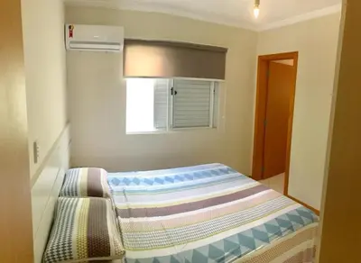 Uma cama ou camas num quarto em Quadra - Mar Rua 263 - Itapema - Meia Praia