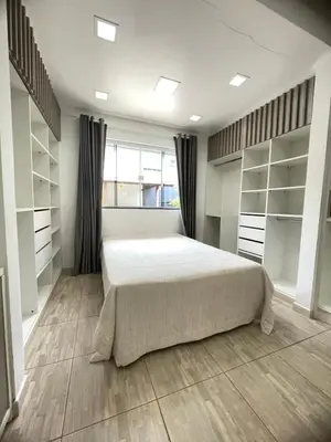 Uma cama ou camas num quarto em Casa piscina com hidromassagem
