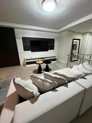 Uma televisão e/ou sistema de entretenimento em Duplex Alto Padrão com Vista Mar