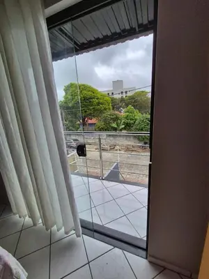 Uma varanda ou terraço em Beautiful Sobrado with air at Canto Grande Bombinhas Beach
