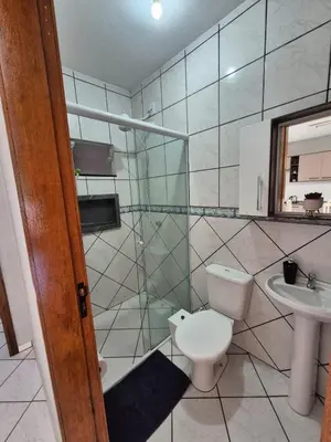 Uma casa de banho em Beautiful Sobrado with air at Canto Grande Bombinhas Beach
