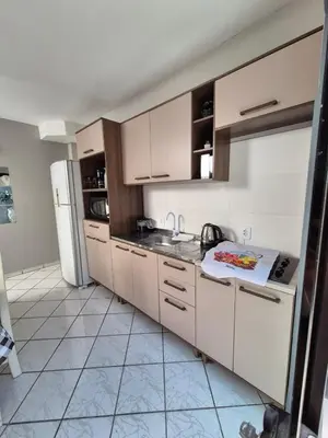 A cozinha ou kitchenette de Beautiful Sobrado with air at Canto Grande Bombinhas Beach