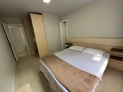 Uma cama ou camas num quarto em Casa Concha 300m Praia de Bombas