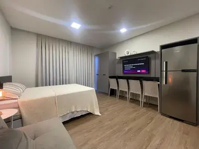 Uma cama ou camas num quarto em B256 - Apto para 04 pessoas com piscina vista mar