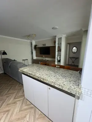 A cozinha ou kitchenette de Apartamento na Praia do Perequê