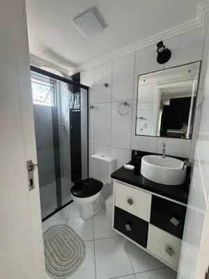 Uma casa de banho em Apartamento na Praia do Perequê