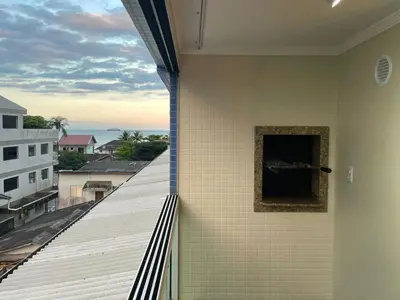 Uma varanda ou terraço em Apartamento na Praia do Perequê