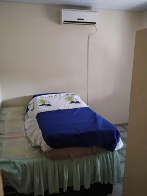 Uma cama ou camas num quarto em Possibilidade