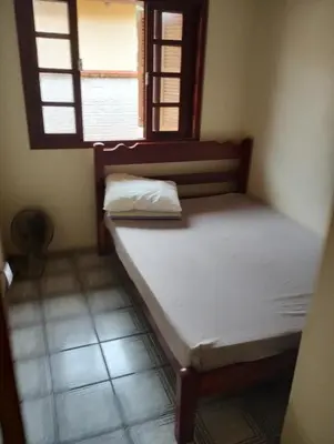 Uma cama ou camas num quarto em Possibilidade