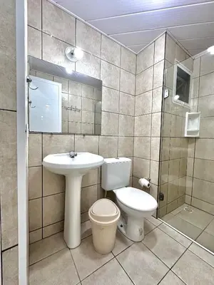 Uma casa de banho em Apartamento a 50 metros da praia em Residencial Solar das Bromélias no Centro de Bombinhas
