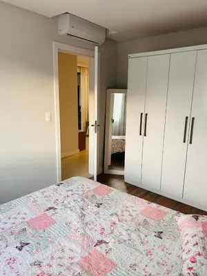 Uma cama ou camas num quarto em Apartamento perto da Praia em Itapema!!!