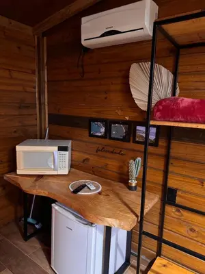 A cozinha ou kitchenette de Pousada Recanto do Canário Suite 4 Premium