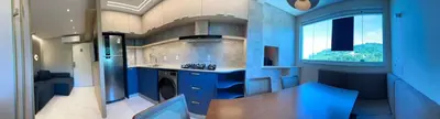 A cozinha ou kitchenette de Apartamento SKY Bridge