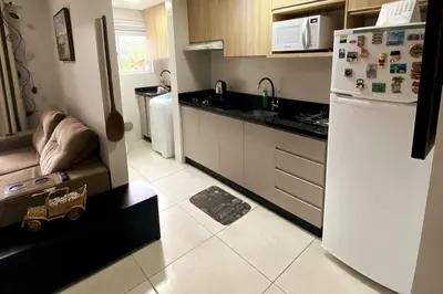 A cozinha ou kitchenette de Apartamento com Ar Condicionado nos dois quartos