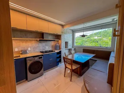 A cozinha ou kitchenette de Apartmento luxo Itapema SC