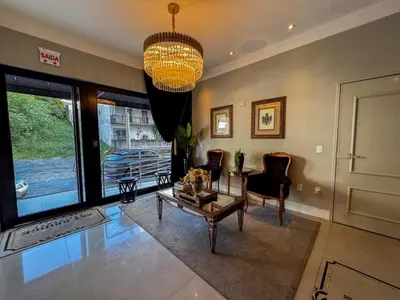 Uma área de estar em Apartmento luxo Itapema SC
