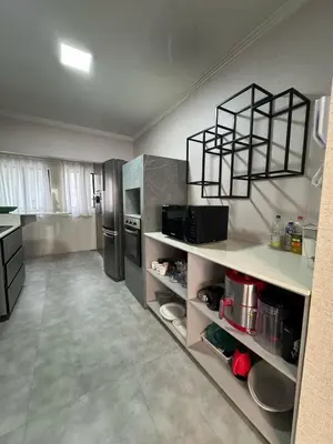 A cozinha ou kitchenette de Apartamento Barra Sul Frente Mar