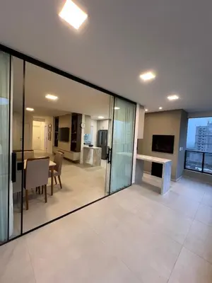 A cozinha ou kitchenette de Apartamento de luxo novíssimo em meia praia itapema