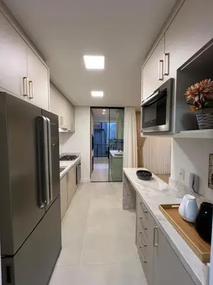 A cozinha ou kitchenette de Apartamento de luxo novíssimo em meia praia itapema