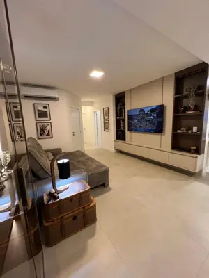 Uma área de estar em Apartamento de luxo novíssimo em meia praia itapema