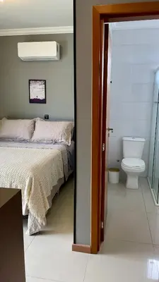 Uma cama ou camas num quarto em Cobertura Colibri