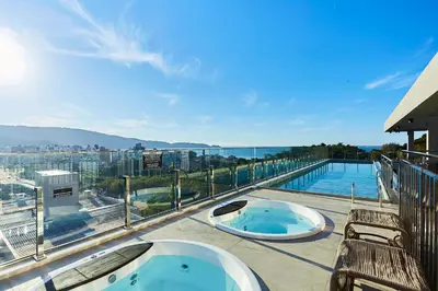 A planta de 1142 Elegance Flat Praia de Bombas Piscina