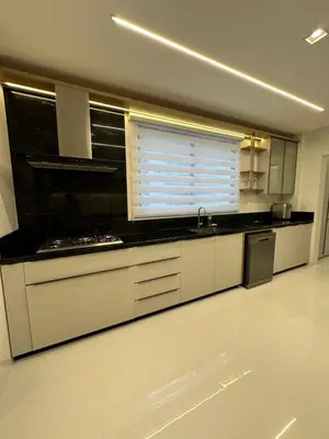 A cozinha ou kitchenette de Apartamento no coração de meia praia com 4 suítes e 3 vagas de garagem
