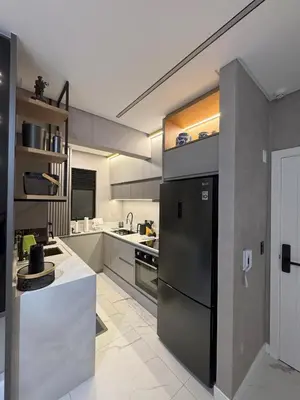 A cozinha ou kitchenette de Luxuoso Apartamento com Rooftop Vista Mar, Piscina Aquecida e Ofurô