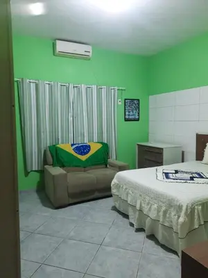 Uma cama ou camas num quarto em Casa 300m da praia