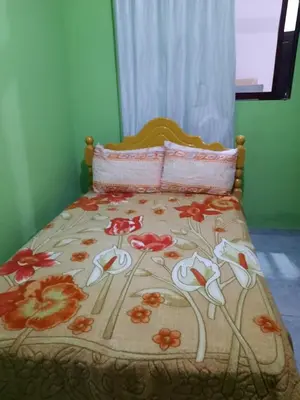 Uma cama ou camas num quarto em Casa 300m da praia