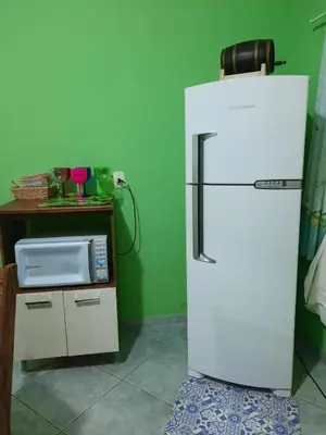 A cozinha ou kitchenette de Casa 300m da praia