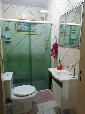Uma casa de banho em Casa 300m da praia
