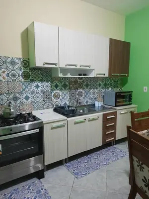 A cozinha ou kitchenette de Casa 300m da praia