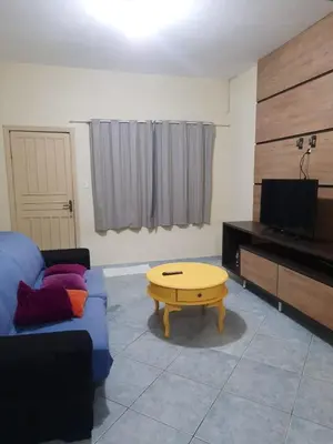 Uma televisão e/ou sistema de entretenimento em Casa 300m da praia