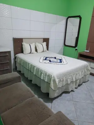 Uma cama ou camas num quarto em Casa 300m da praia