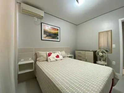 Uma cama ou camas num quarto em Praia de Palmas - Excelente apartamento