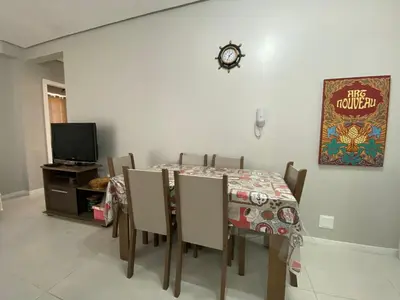 Uma televisão e/ou sistema de entretenimento em Praia de Palmas - Excelente apartamento