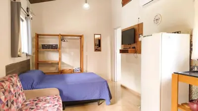 Uma cama ou camas num quarto em ROD_02 Monoambiente confotable para parejas
