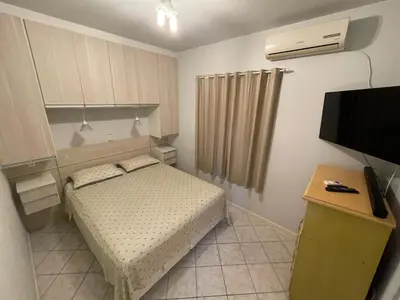 Uma cama ou camas num quarto em Casa na Praia de Palmas - 400 metros da praia