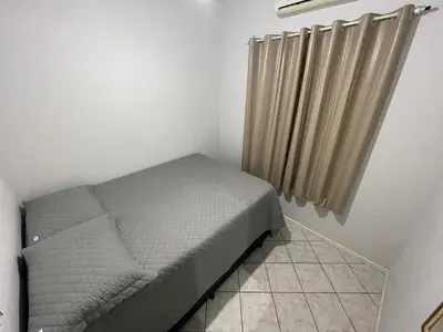 Uma cama ou camas num quarto em Casa na Praia de Palmas - 400 metros da praia